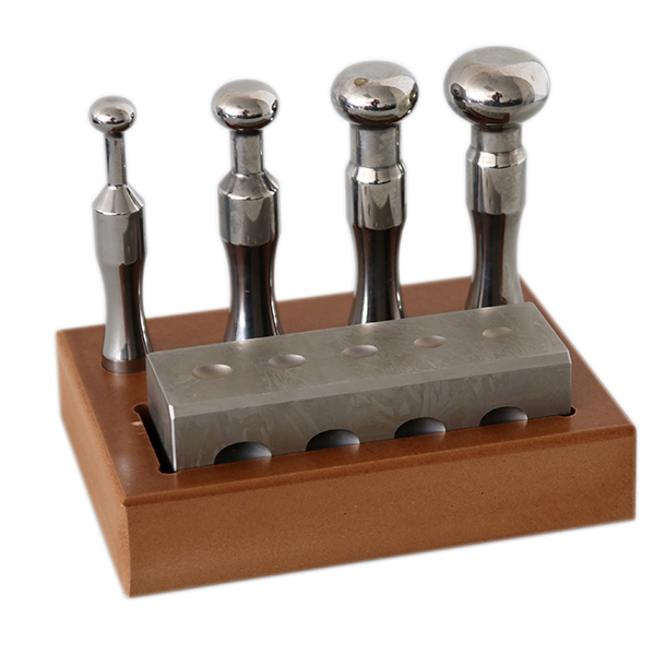 Bottoniera ovale con 4 imbottitoi Bottoniera ovale con 4 imbottitoi